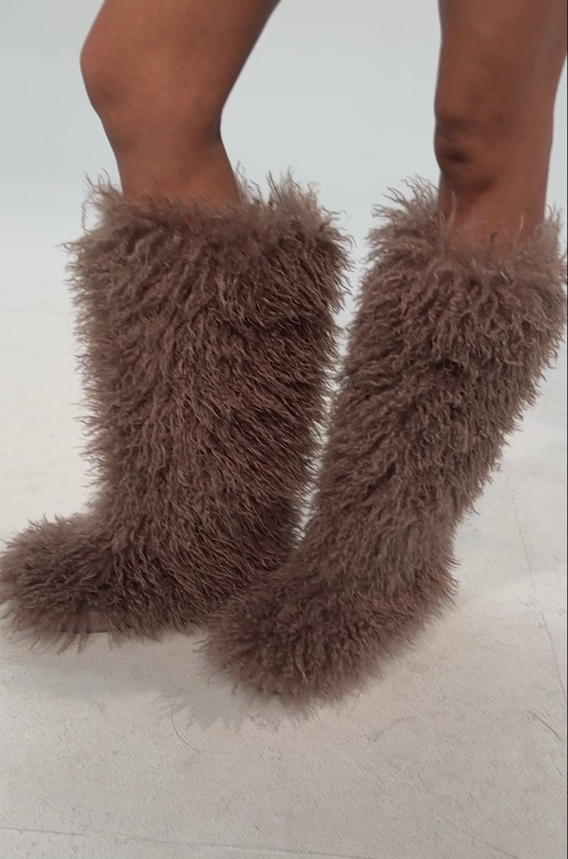 Video of woman modeling the AZALEA WANG DENTON Taupe Knee High Flat Fur Boots
