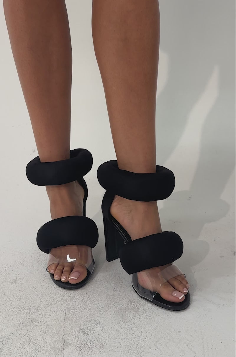 A video of a person wearing the YANIX BLACK PUFF SLIP ON SANDAL.
