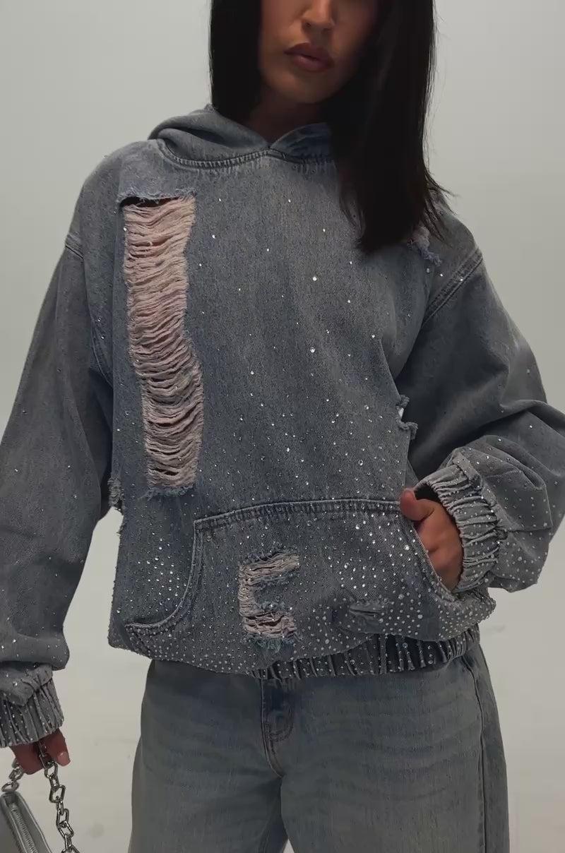 Video of a woman modeling the DISTRESSED GALAXY HOODIE.