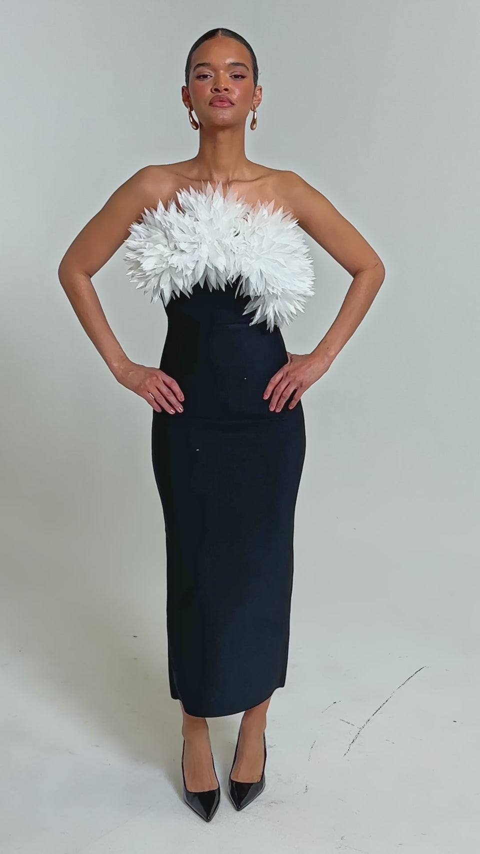 HEART ON MY SLEEVE BANDAGE MIDI DRESS IN BLACK – AKIRA