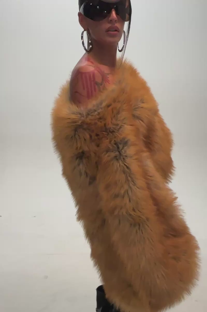 Video of a woman modeling the SNOW DAY FAUX FUR SWEATER.