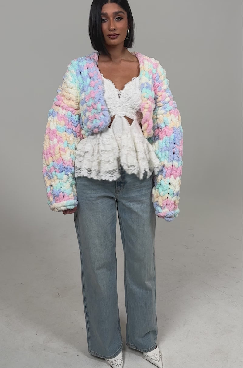 Video of woman modeling the ALIA CHUNKY CHENILLE KNIT CARDIGAN