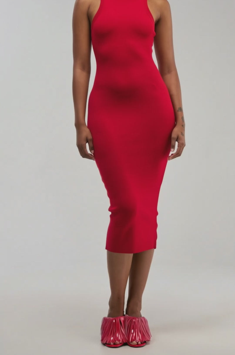Video of a woman modeling the CUTIE PIE KNIT MIDI DRESS IN RED, a fitted, sleeveless knit tank dress.