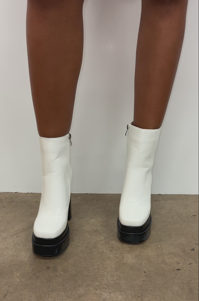 Video of person modeling the AZALEA WANG MATEO Chunky Platform Booties 