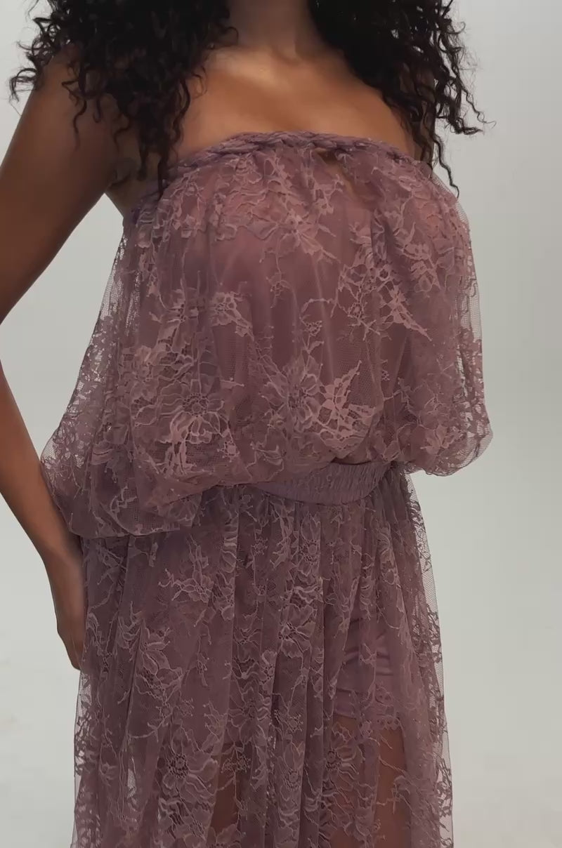 Video of a woman modeling the HANNAH LACE BLOUSE IN MAUVE—an elegant strapless top that’s perfect for making a statement on date night.