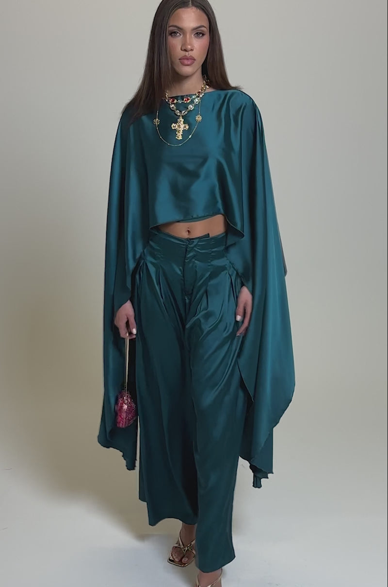 Video of woman modeling the GIRLS FOR LIFE EMERALD BLOUSE, making a lasting impression.
