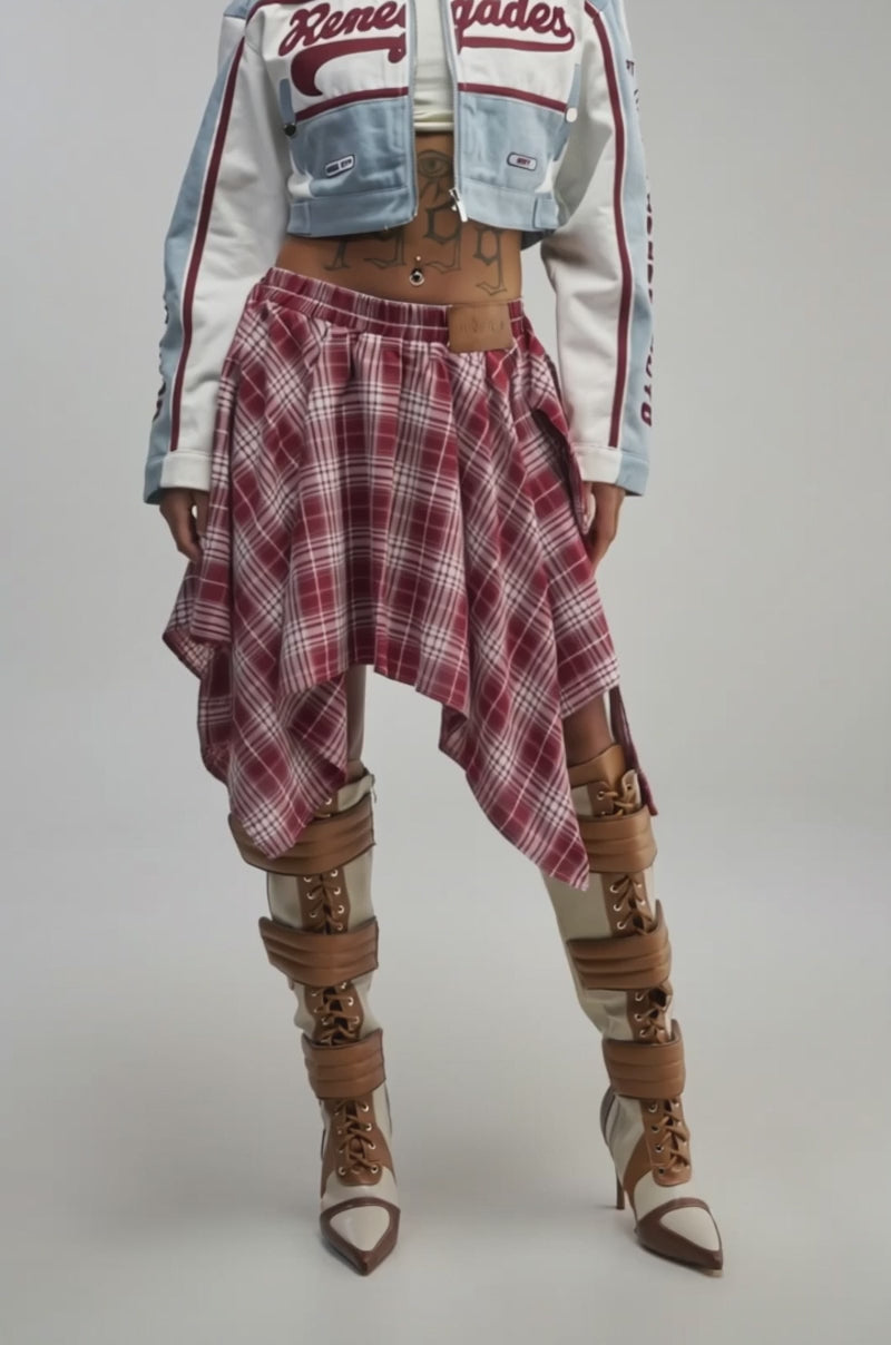 Video of a woman modeling the TIME FOR SOME FUN PLAID MINI SKIRT in red.