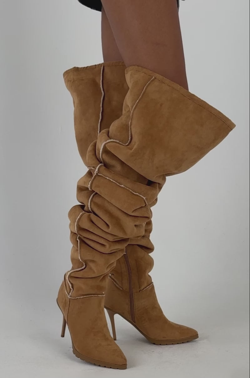 Video of a woman modeling the AZALEA WANG FABIOLA CAMEL SHERPA STILETTO THIGH HIGH BOOT. 