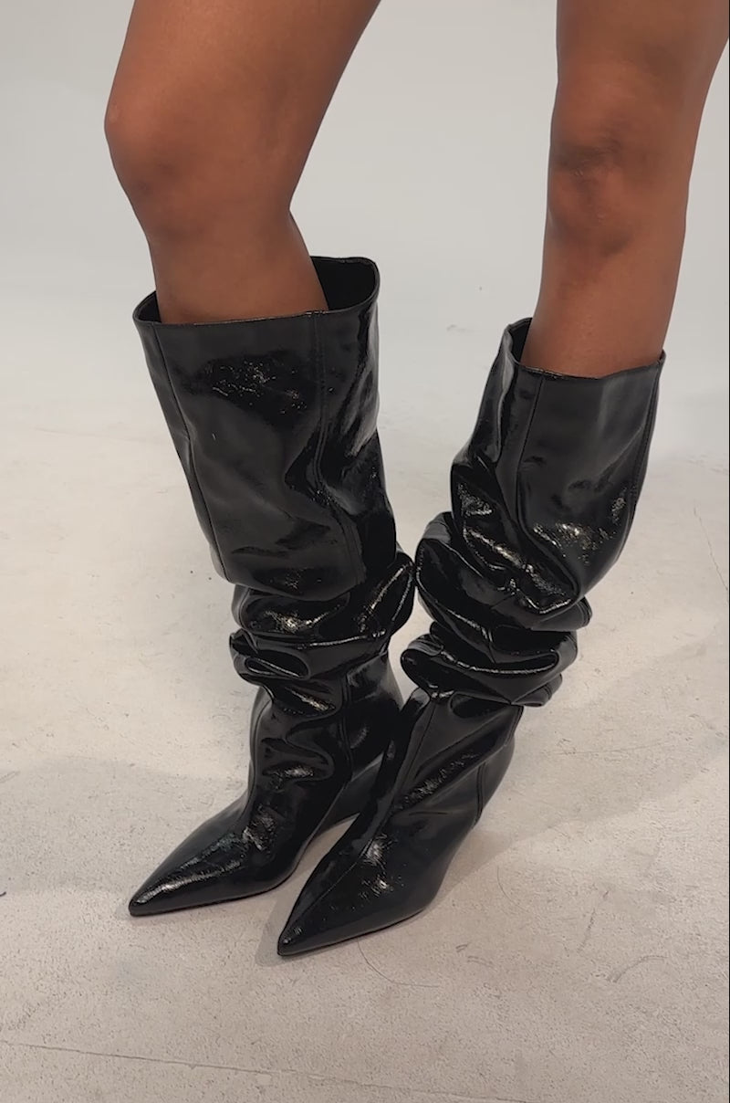 Video of woman modeling the AZALEA WANG AVIELLE BLACK RUCHED BLACK WEDGE BOOTS