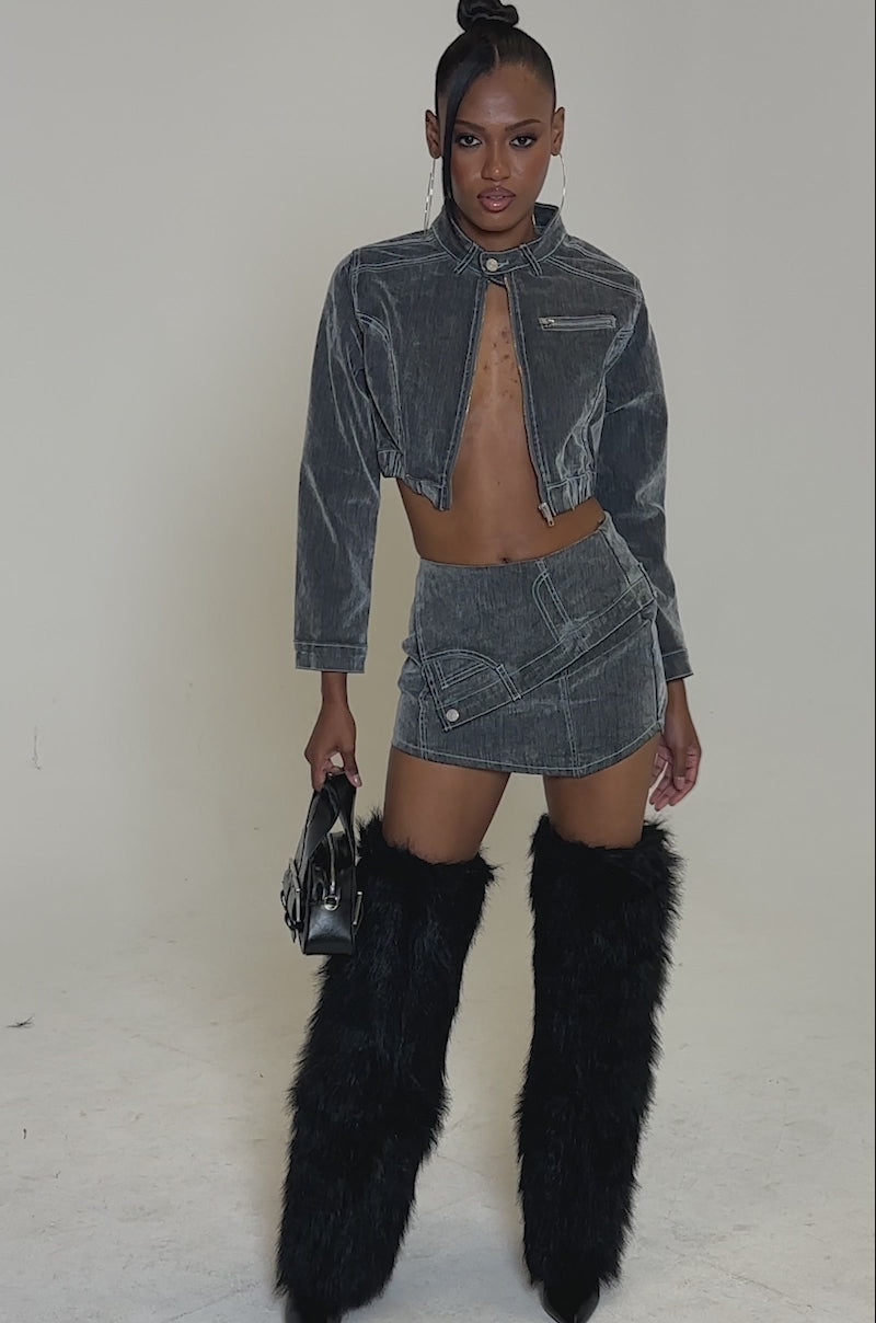 Video of woman modeling the ALL FOR LOVE VELVET DENIM MINI SKIRT, styled with matching jacket