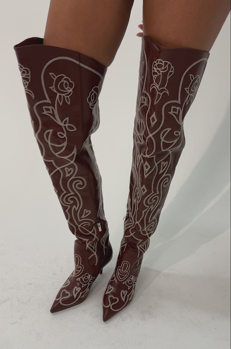 Video of woman modeling the AZALEA WANG KETA BROWN WESTERN THIGH HIGH STILETTO BOOTS against a neutral background.