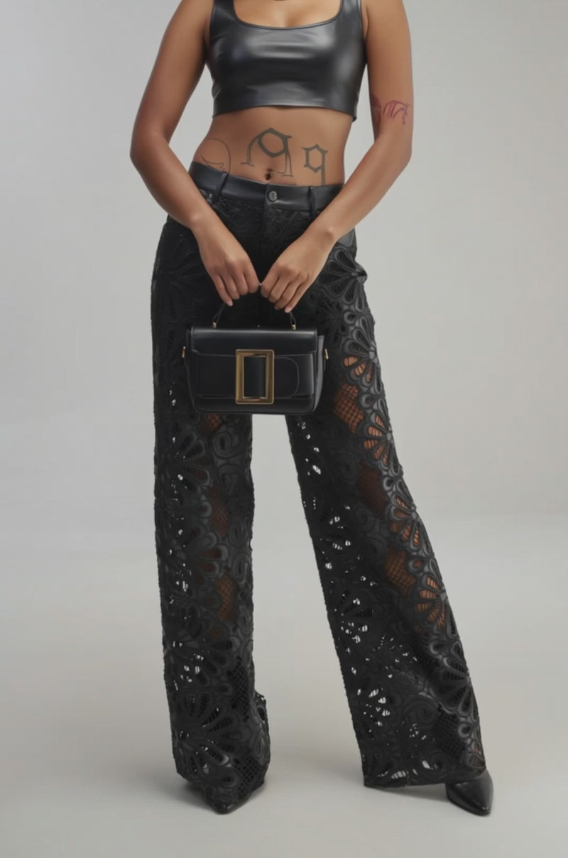 Video of a woman modeling the LUCKY ME TROUSER—black lace wide-leg streetwear pants.