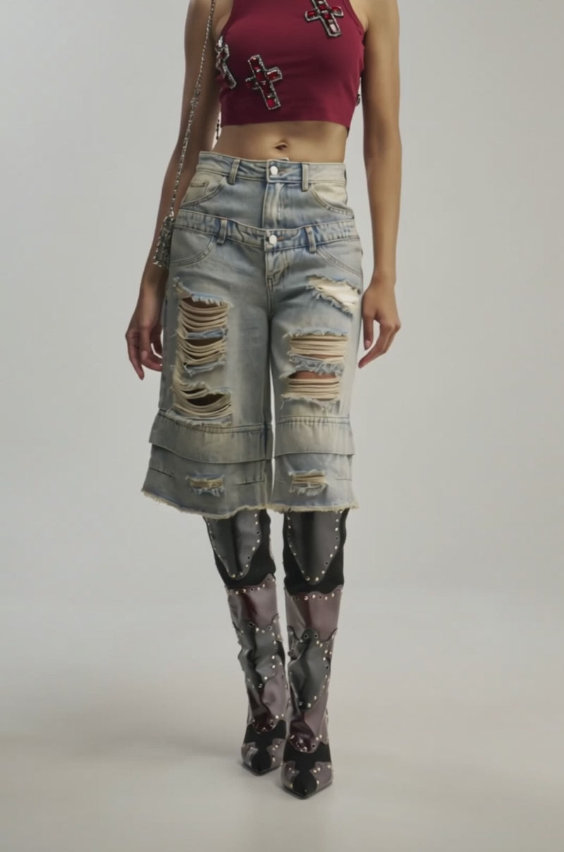 Video of a woman modeling the GO GET SOME DENIM BERMUDA SHORTS.