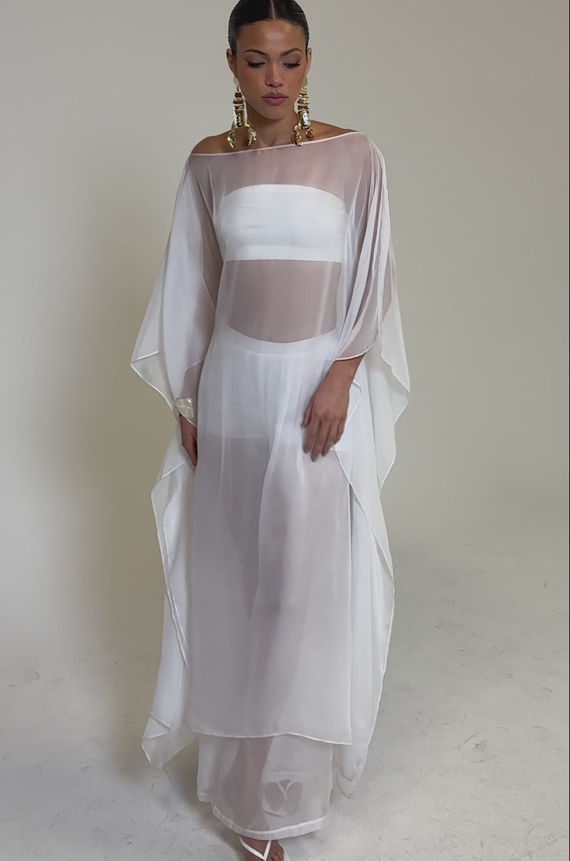 Video of woman modeling the DREAMY SHEER BLOUSE 