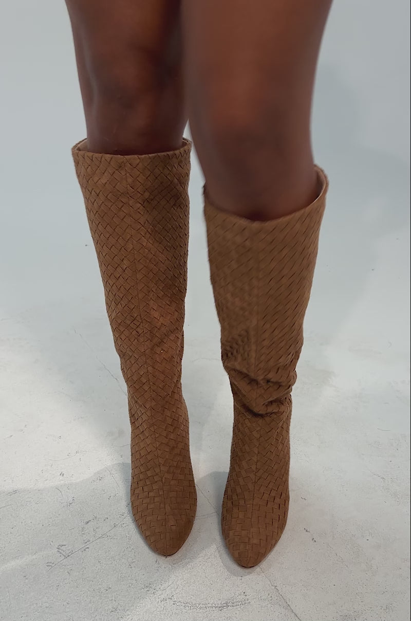 A video of a person wearing blue denim shorts with floral embroidery and AZALEA WANG JUDY TAN SUEDE BLOCK HEEL BOOT.