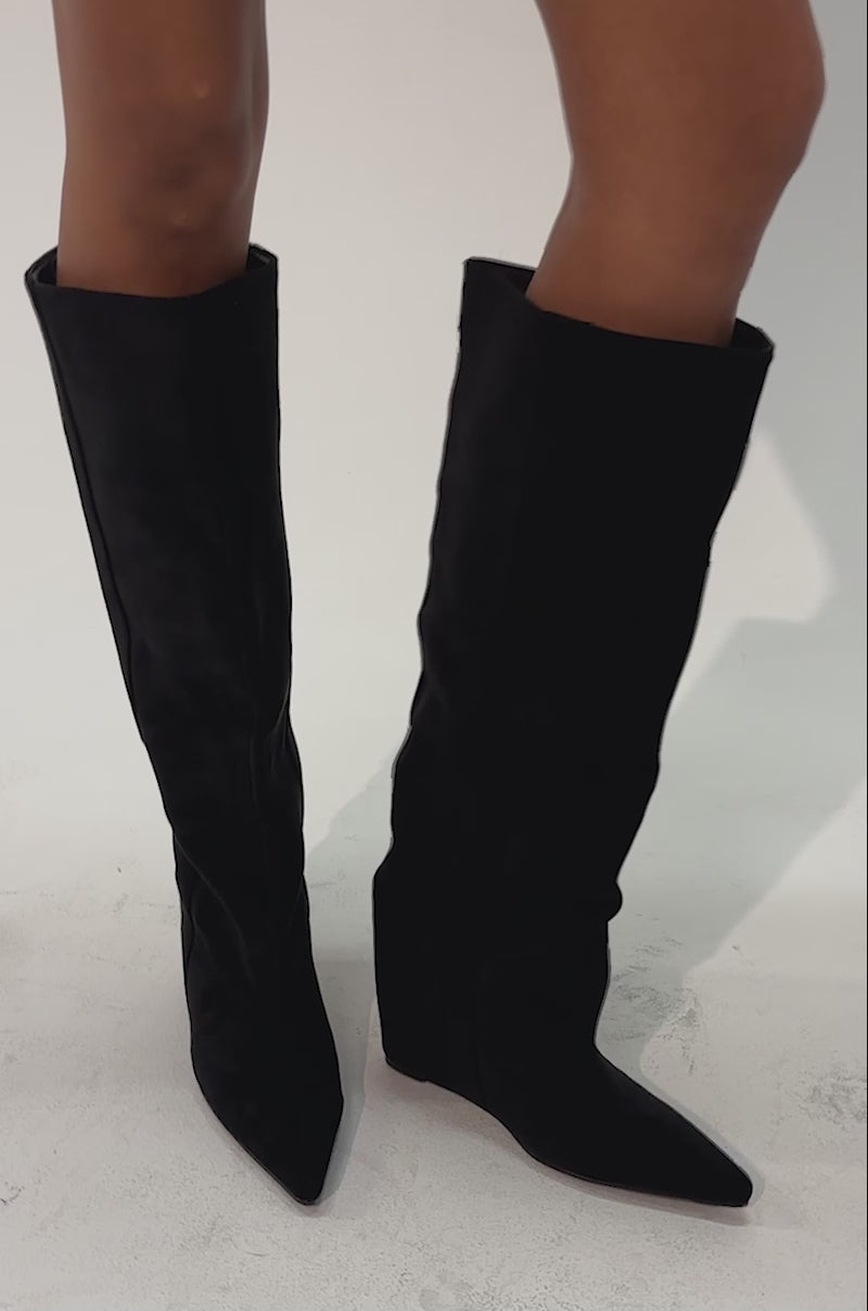 Video of a woman modeling the AZALEA WANG FRANCES Black Faux Suede Hidden Wedge Boots with pointed toes.