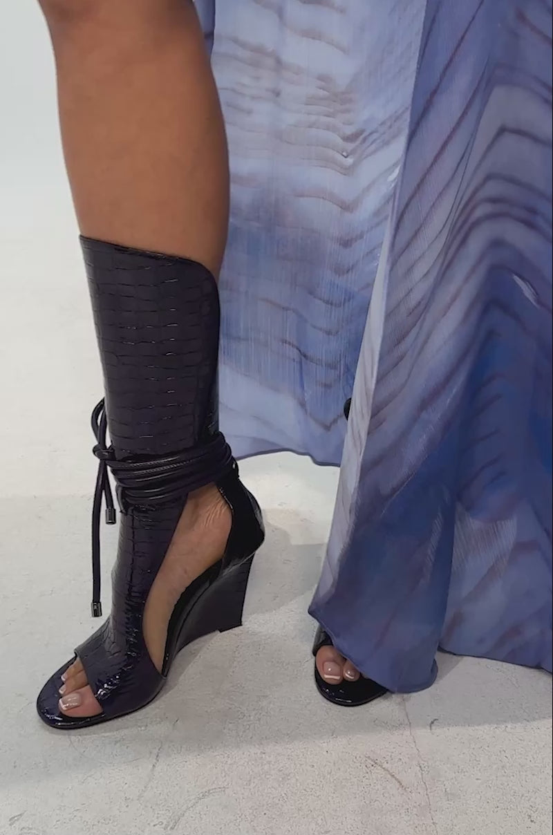 Video of woman modeling the AZALEA WANG DOUMA PURPLE CROC WEDGE SANDAL