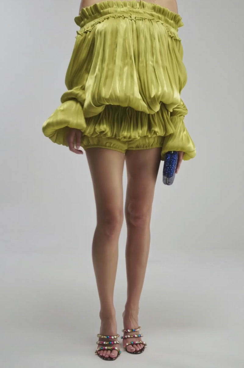 Video of a woman modeling the BEAUTY QUEEN BLOUSE—with its shiny, off-the-shoulder satin-effect design.