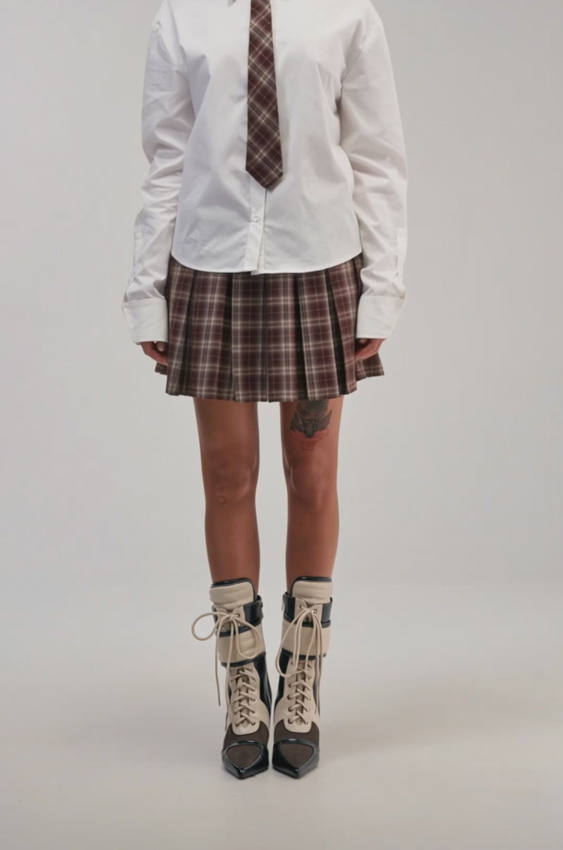 Video of a woman modeling the SCHOOL GIRL VIBES BUTTON DOWN.