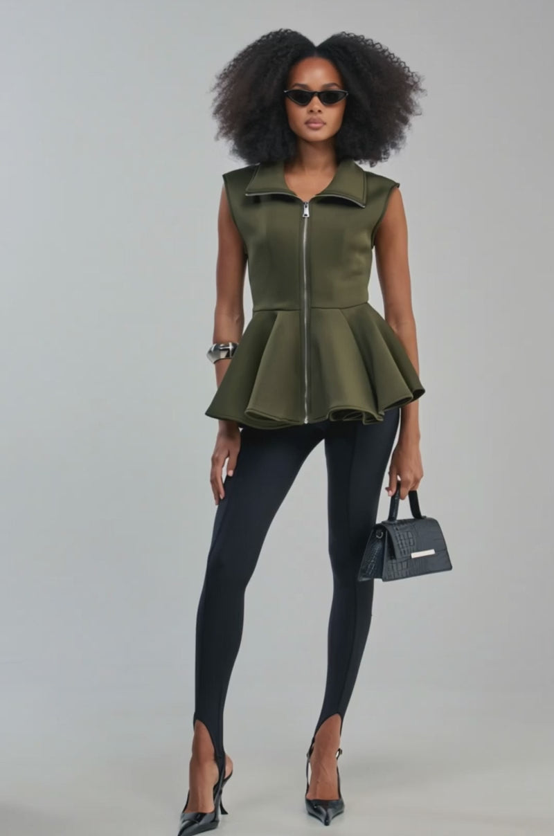 Video of a woman modeling the LOTTIE NEOPRENE PEPLUM VEST IN OLIVE/