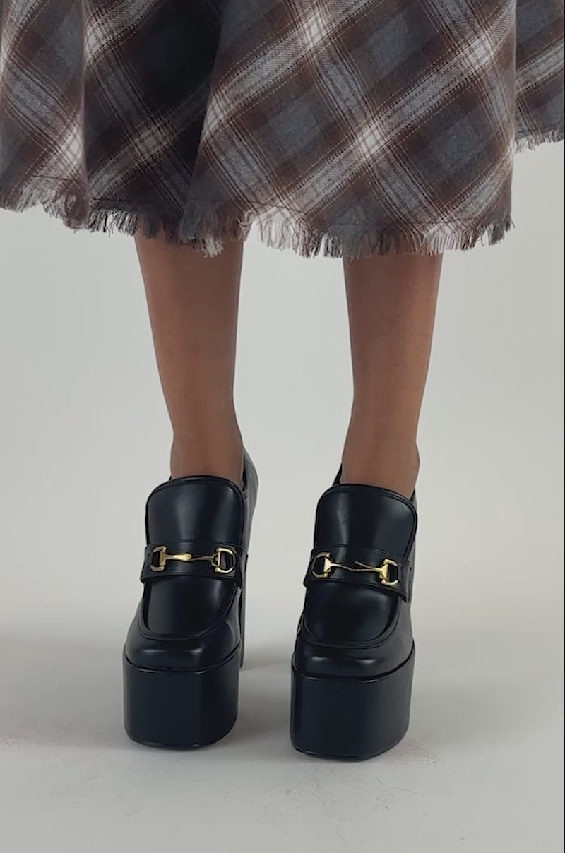 Video of a woman modeling the AZALEA WANG JUSTLY BLACK PU PLATFORM BLOCK HEEL PUMP.