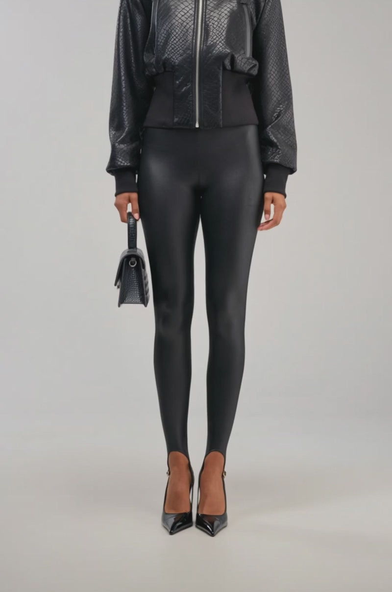 Video of a woman modeling the NAOMI FUNNEL NECK BOMBER—a black jacket with a croc-embossed texture.