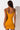 Back View Reyla Mini Bodycon Dress in Dark Yellow