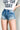 Side View Risking It All High Waisted Stretchy Jeans Shorts With Pearls in Medium