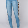 Front View Rock The Runway Lace Up Skinny Jeans in Light Blue Denim