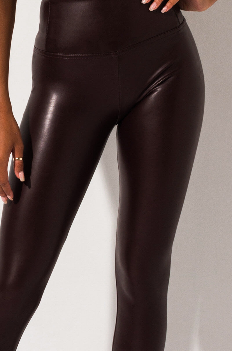 Detail View Slim Thicc Faux Leather Leggings  in Burgundy