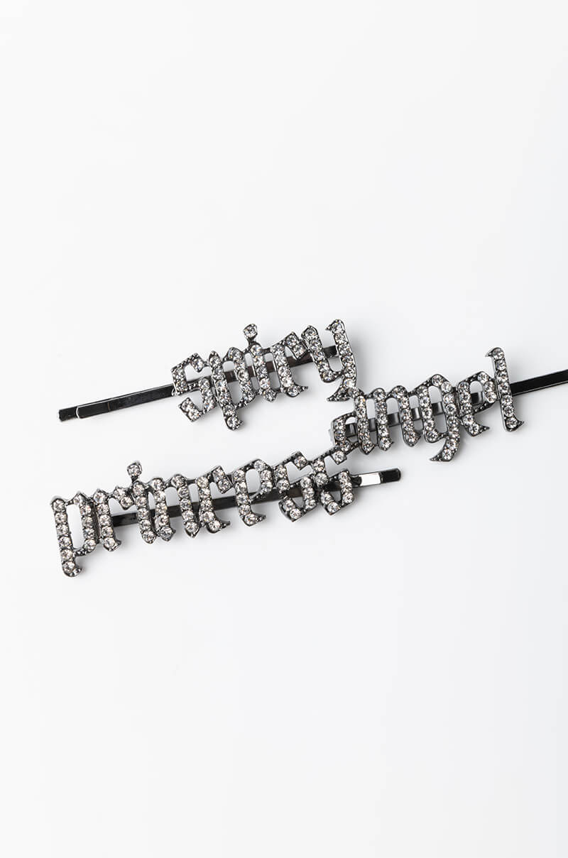 The SPICY PRINCESS HAIR CLIP SET includes three hairpins with rhinestones, each spelling out a different word: "spicy," "princess," and "angel." The hairpins are displayed on a plain white background.