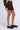 Side View Straight To Business Pinstripe Mini Skirt In Brown