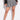 Front View Swoosh Plaid Pleated Skirt