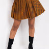 Front View Swoosh Pleated Skirt in Orange Multi