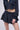 Detail View Thinking Of A Place Pleated Knit Mini Skirt