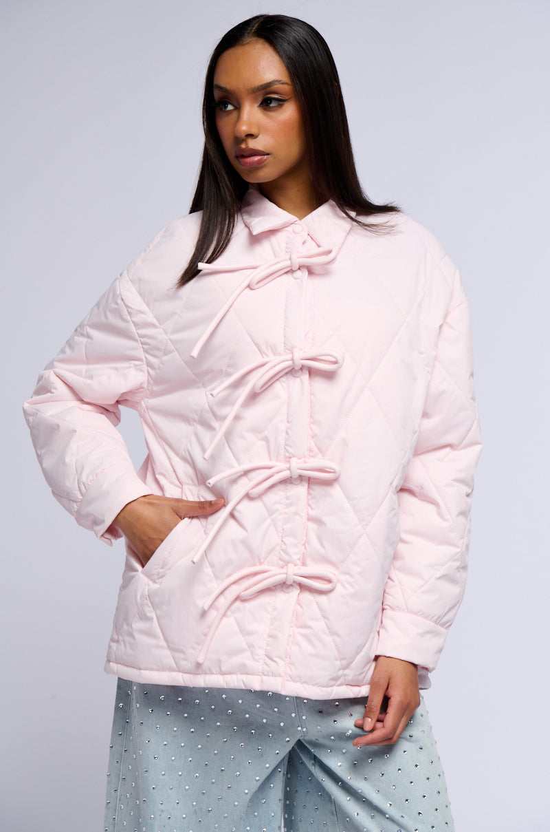 Side View Tribecca Pale Pink Quilted Bomber With Bows