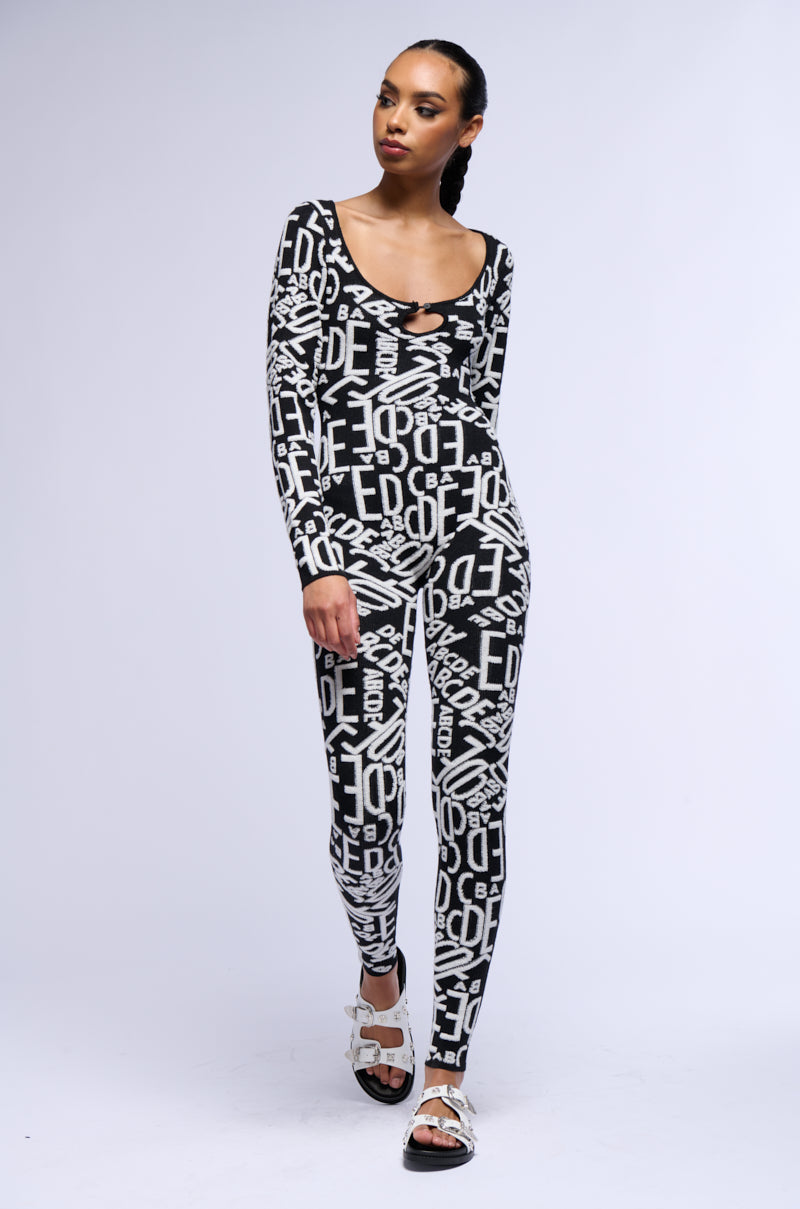 TURNING HEADS KNIT LONG SLEEVE JUMPSUIT IN BLACK view 0