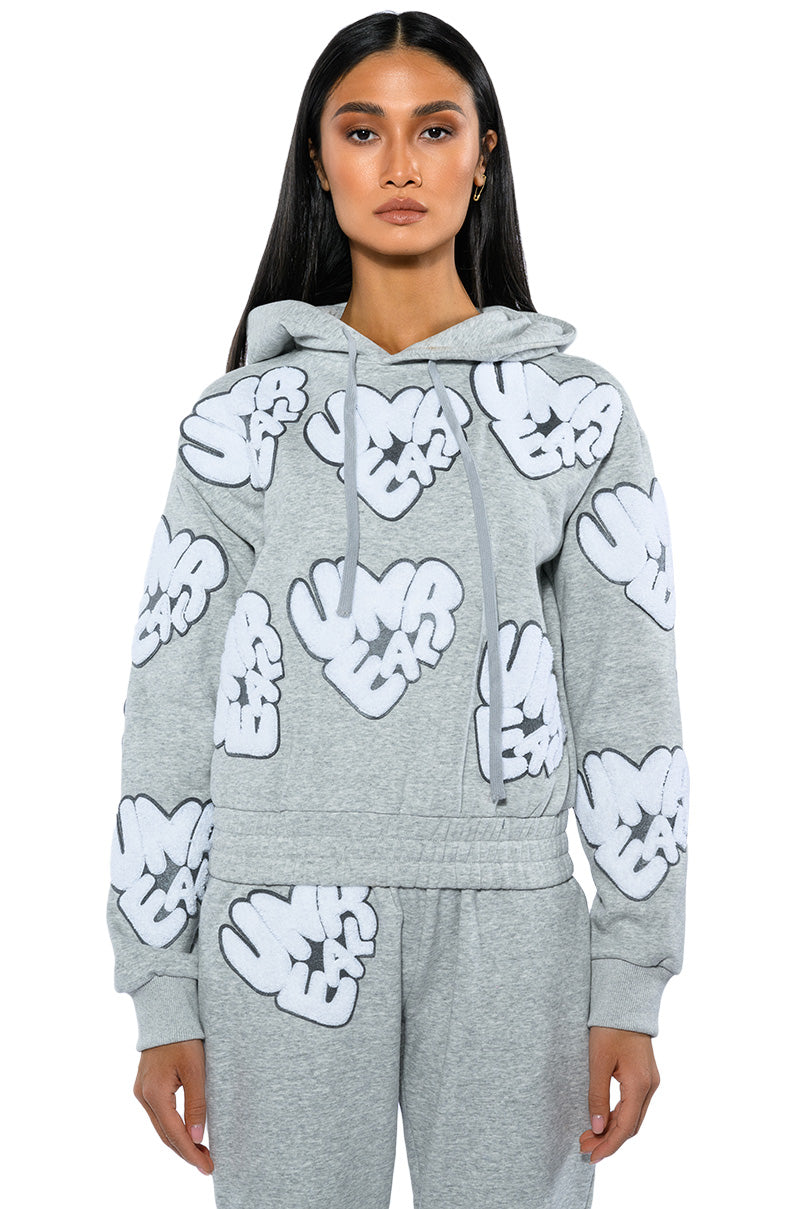 Detail View Unreal Hoodie With Patches