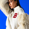 Front View Upper East Side Faux Fur Sleeve Sweatshirt