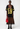 A person poses against a white background in the CITY GIRL LAYERED JERSEY MIDI DRESS—black mesh with 