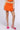 Front View Violet Girl Pleated Mini Skirt In Orange