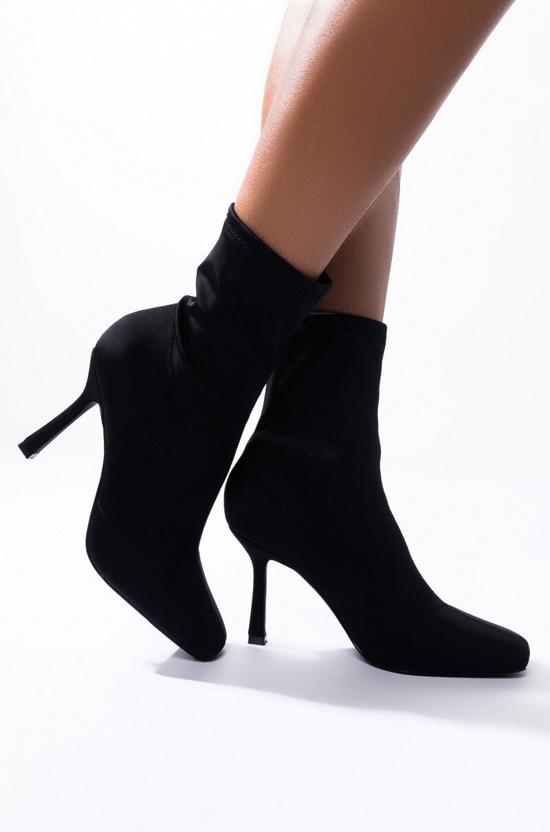 Side View Wait For Me Stiletto Bootie in Black 1
