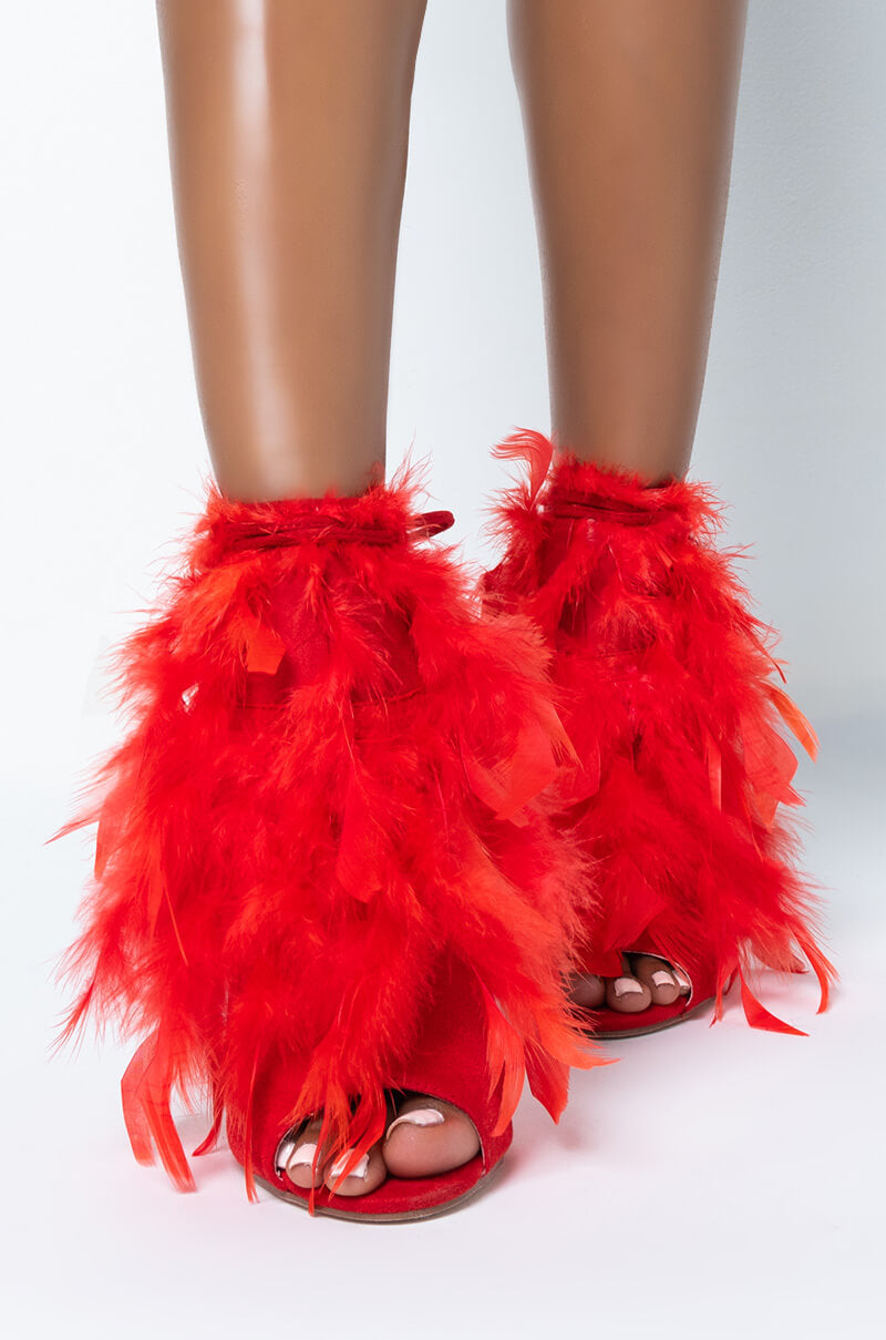 Side View What Dreams Are Made Of Feather Stiletto Sandal in Red