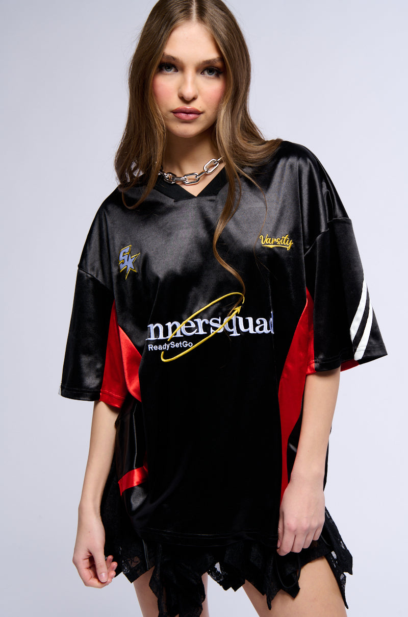 Back View Winner Squad Varsity Jersey In Black