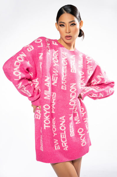 WORLD TRAVELER OVERSIZED SWEATER DRESS  AKIRA