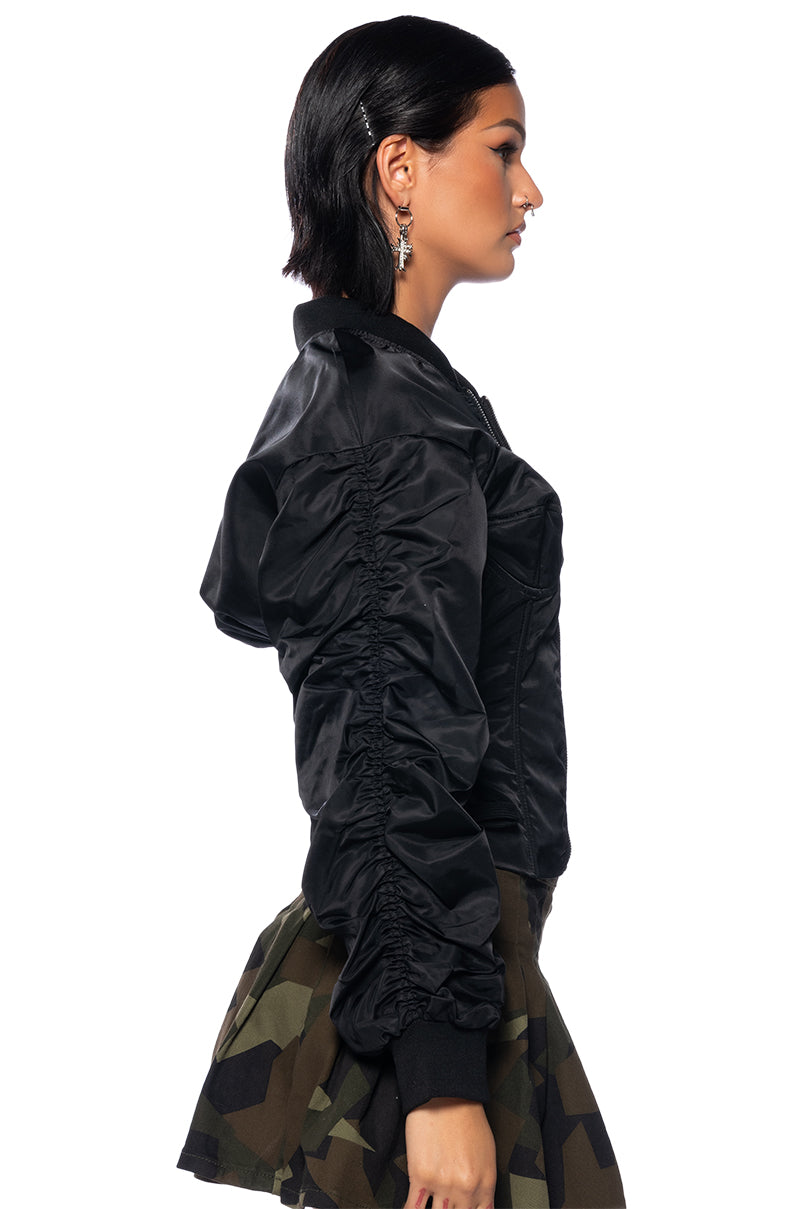 Detail View Your Move Fitted Corset Bomber With Adjustable Side Lace Up Detailing In Black