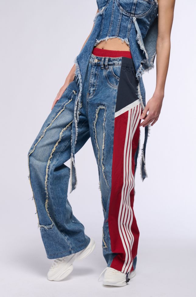 Side View All Around The World Patchwork Denim Jogger Pant In Red Multi