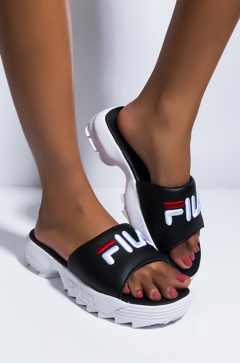 fila sandals on feet
